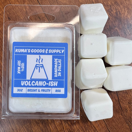 Kuma's Goods & Supply Volcano-ish wax cubes in packaging on a wooden surface