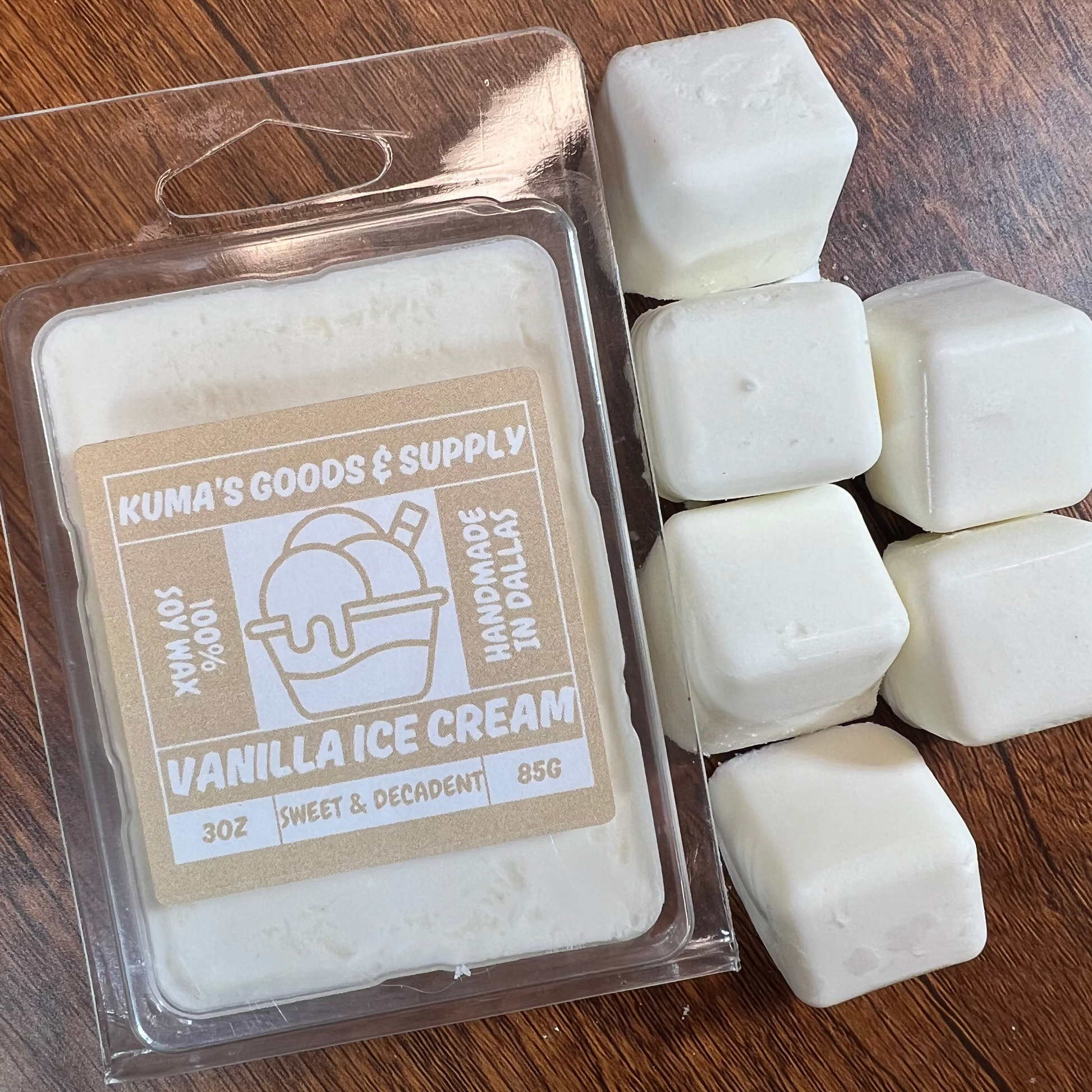 Kuma's Goods & Supply vanilla ice cream scented wax melts on a wooden surface